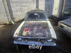 1969 Ford Cortina Mk2 
<br/>

 	  <br/>
 
Traduction en français : Ford Cortina Mk2 de 1969